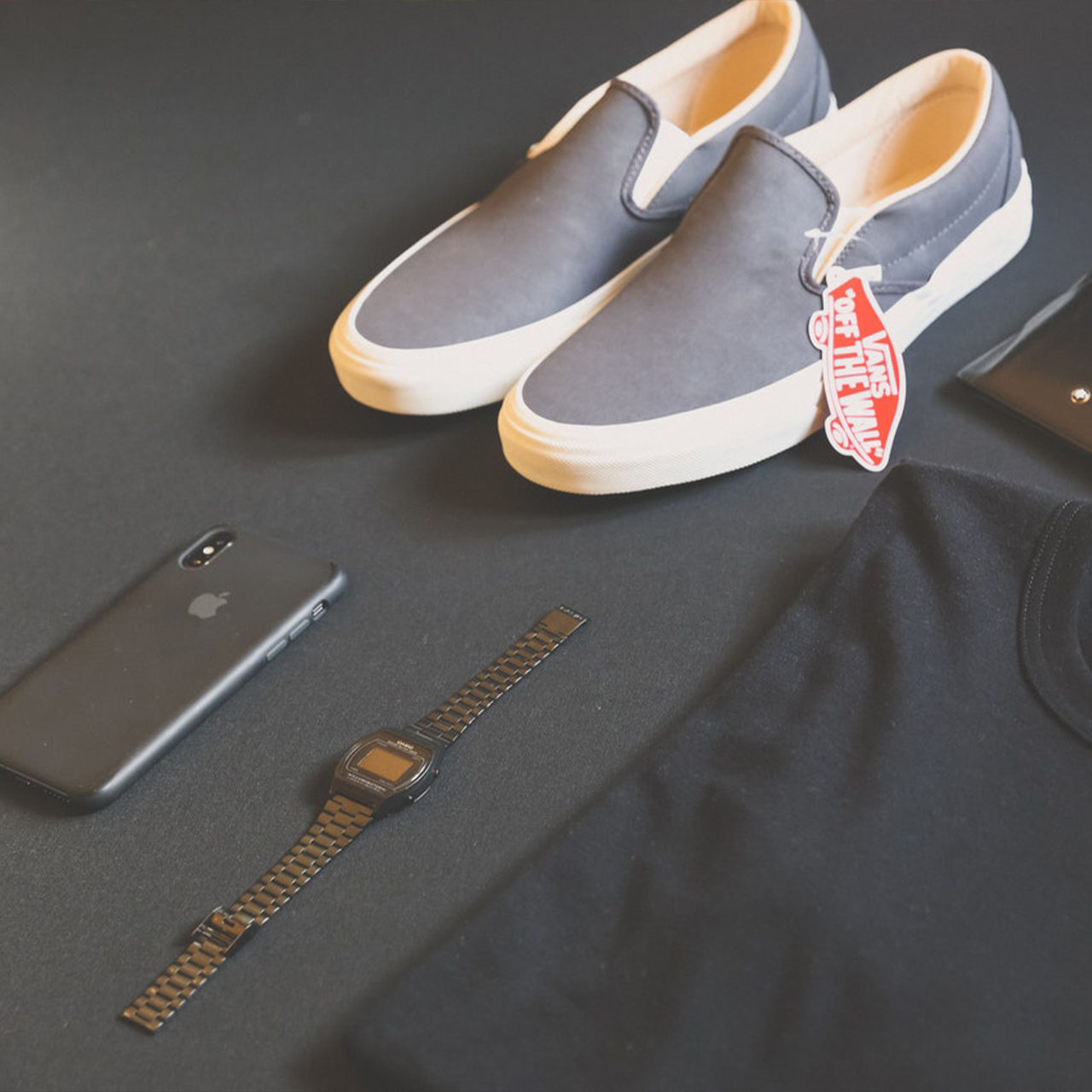 pair-of-gray-vans-low-top-sneakers-apple-iphone-casio-watch